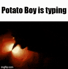 a picture of a potato boy is typing on a keyboard