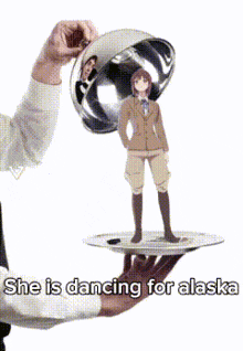 a person holding a plate with a picture of a person on it