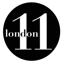 a black circle with the number 11 and the word london