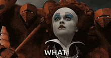 the queen of hearts from alice in wonderland is standing in front of a group of robots and asking what .