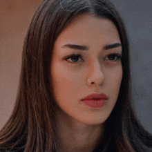 a close up of a woman 's face with red lips
