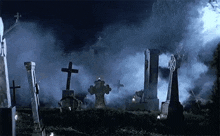 a cemetery filled with graves and crosses at night with smoke coming out of the ground .
