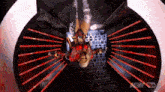 a woman in a red and silver outfit is hanging upside down in a tunnel with red lights behind her