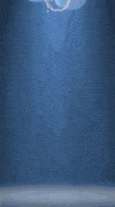 a blue background with a white object floating in it