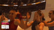 a youth olympic games advertisement with a group of gymnasts