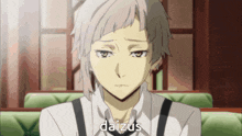a white haired anime character with the name daizus written on his face