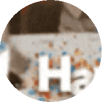a circle with the letter h in the center