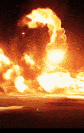 a large explosion with a lot of flames and smoke coming out of it