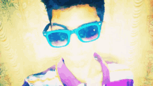 a young man wearing sunglasses with the word thankyou written in the background