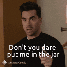 a man says " don t you dare put me in the jar " while pointing at something