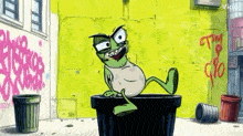 a frog is sitting on top of a trash can in a cartoon scene .