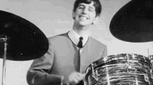 ringo starr playing drums smile happy the beatles