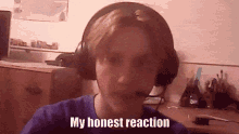 a man wearing headphones and a headset says my honest reaction