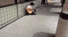 A Man Was Going Grocery Shopping When He Saw A Guy Playing An Amazing Tune On His Guitar. GIF - Guy Guitar Acoustic GIFs