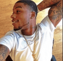 a man taking a selfie with his hand in his hair