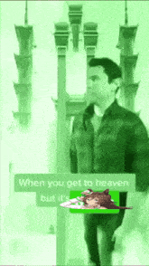 a man in a plaid shirt is walking in front of a tower with a green background and a cartoon girl on it .