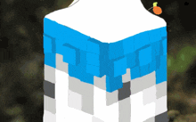 a drawing of a cube with blue and white squares on it