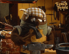 a cartoon character from the treacle people is working on a shoe