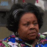 a close up of a woman 's face with the words tyler perry 's house of payne visible