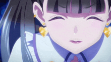 a close up of a girl 's face with a heart shaped earring on her left ear