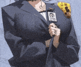 a woman in a suit has a badge on her shoulder that says ' amanda ' on it