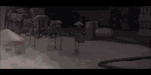 a group of robots are standing in a room with smoke coming out of it