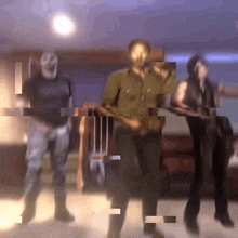 a group of people dancing in a room with a glitch effect