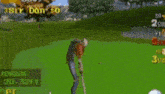 a person is playing a game of birdie on a green