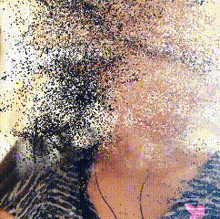 a pixelated image of a woman 's face with a pink heart on her shirt