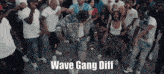 a group of people are dancing with the words wave gang diff on the bottom right