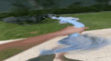 a blurry picture of a person holding a blue cloth