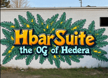 a mural on a brick wall that says hbarsuite the og of hedera