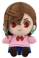 a stuffed doll with brown hair and red eyes is sitting on a white surface
