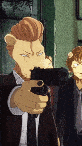 a man in a suit and tie is pointing a gun at something