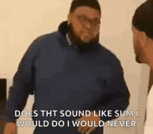 a man in a blue jacket is talking to another man in a white shirt .