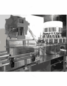 Bottle Capping Machine Machine GIF - Bottle Capping Machine Machine Operation GIFs
