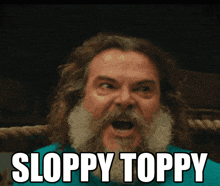 a man with a beard says sloppy toppy in front of his face