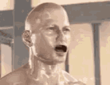 a close up of a mannequin 's head with its mouth open .