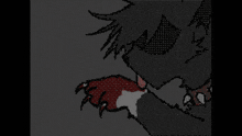 a pixelated image of a person 's hand with red spots