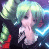 a cartoon girl with green hair is covering her nose with her hand