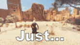 a man is standing in the desert with the words just written above him