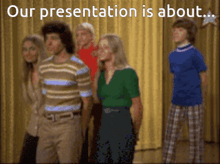 a group of people standing in front of a yellow curtain with the words " our presentation is about "