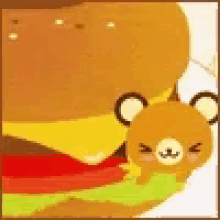 a teddy bear is sitting next to a hamburger on a white background .