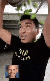a man wearing a black polo shirt throws a bowl of green apples