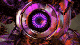 a close up of a machine with a purple light in the center