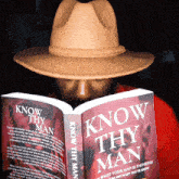 a man is reading a book titled know thy man