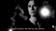 a black and white photo of a man with the words " i don 't do jealous not with you not anymore "