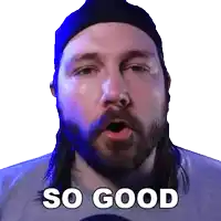 a man with a beard is wearing a blue hat and says " so good "