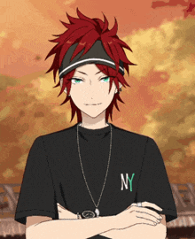 a boy with red hair wearing a ny t-shirt