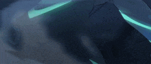 a person 's legs are visible in a dark room with a green light coming out of them